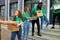 Active young people enjoys volunteering at food and clothes bank