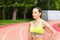 Active young woman training at outdoor stadium