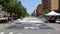 Activists paint huge Black Lives Matter sign on the road, Central Harlem, New York, NY, USA