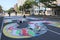 Activists paint huge Black Lives Matter sign on the road, Central Harlem, New York, NY, USA