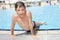 Activities on the pool. Cute boyplaying in swimming pool