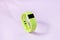 Activity smart tracker on light pink background. Green fitness health watch with fern shadow, sport bracelet