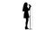 Actress sings pop music at the concert. White background. Silhouette. Side view. Slow motion