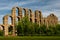 The Acueducto de los Milagros English: Miraculous Aqueduct is the ruins of a Roman aqueduct bridge, part of the aqueduct built