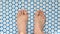 Acupuncture massage mat and male feet