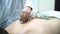 Acupuncture therapist placing a cup on the back of a male patient, ancient Chinese alternative medicine. Close up for a