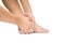 Acute pain in foot. hand massage foot white