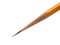 An acutely honed pencil on a white background