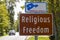 Ad sign at the entry of one of Maryland`s scenic byways named `Religious Freedom`