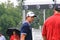 Adam Scott talks to his hitting coach