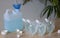 Add alcohol gel from the gallon bucket to the alcohol gel sachet bag. On the table and the white wall. for washing hands Anti-