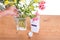 Add liquid bleach into vase with water to keep flowers fresher