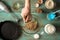 Adding flour in glass bowl for cooking pancakes top view