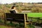 Adele, sitting on the bench, at Sprotbrough Flash.