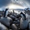 Adelie Penguins Huddled on Rocky Shoreline with Breathtaking Antarctic Landscape in Background