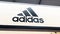 Adidas logo sign and text brand interior of sporty shop shoes of sport footwear