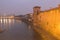 Adige River and ancient wall of Castelvecchio at night, Verona, Italy