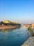Adige River and fortified bridge Verona Castel Vecchio Bridge. Verona, Italy