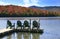 Adirondack chairs on lake