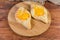 Adjarian khachapuri on the wooden serving board on rustic table