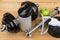 Adjustable dumbbells, plastic shaker, apple and measures tape