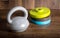 Adjustable kettlebell on wooden background. Weights for a fitness training.