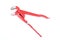 Adjustable red pipe wrench isolated on a white background, surface. Plumber`s working tool, equipment. Path saved
