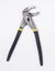 Adjustable water pump pliers with black handles isolated on white background.Universal wrench. Professional tool for work.