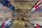 Adjustable water pump pliers, needle nose pliers and locking pliers on a wooden background. Top view