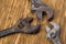 Adjustable wrenches on a wooden background