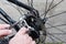 Adjusting Bicycle Gears with Pliers and Key