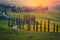 Admirable buildings in the grain fields at sunset, Tuscany, Italy