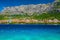 Admirable Makarska cityscape with beach and high mountains, Dalmatia, Croatia