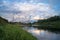 Admirable view of the evening sky over the Volga river and its picturesque shores. Russian provincial town Rzhev.