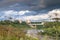 Admirable view of the stormy sky over the Volga river and its picturesque shores. Russian provincial town Rzhev.