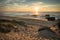 Admiring scenic sunset in blue yellow orange sky background on atlantic coast, capbreton