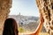 Admiring sunset from a grotto cave on Sassi di Matera, Basilicata, Italy.