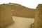 Adobe brick wall of Huaca Pucllana or Huaca Juliana, the Pre-Inca ruins in Miraflores district, Lima, Peru