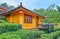 Adobe Chinese house amid tea shrubs, Ban Rak Thai Yunnan tea village, Thailand