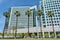 Adobe logo is displayed on Adobe Inc. office headquarters towers. Logo features the alphabet `A` portrayed in white on a red