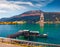 Adorable autumn view of Tower of sunken church in Resia lake.