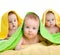Adorable babies or kids in colorful towels