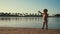 Adorable baby boy enjoying holiday at beach. Active child playing at coastline.