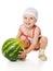 An adorable baby happily plays the watermelon