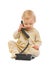 Adorable baby speaking on phone on white