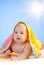 Adorable baby with sun and sky