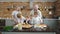 The adorable big family runs into the frame and start eating pizza in kitchen.