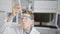 Adorable blond boy scientist totally immersed in experiment, looking at test tube, full of security and focus in lab, little face