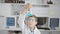 Adorable blond boy scientist totally immersed in experiment, looking at test tube, full of security and focus in lab, little face