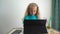 Adorable blond girl child play with tablet. Computer addict kid. Gimbal motion